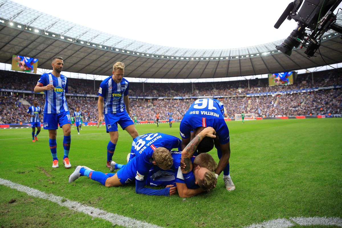BERLIN, GERMANY - SEPTEMBER 22: Football players of Hertha BSC celebrate after scoring a goal during the Bundesliga match between Hertha BSC against Borussia Monchengladbach at Olympiastadion in Berlin, Germany on September 22, 2018. 