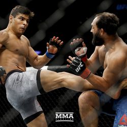 Paulo Costa lands a kick to the body at UFC 217.