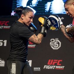 Raquel Pennington hits mitts at the UFC Denver open workouts.