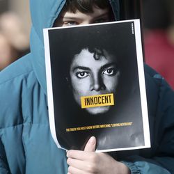 Dylan Steffen protests "Leaving Neverland," a documentary about Michael Jackson, outside of the Egyptian Theatre during the Sundance Film Festival in Park City on Friday, Jan. 25, 2019.