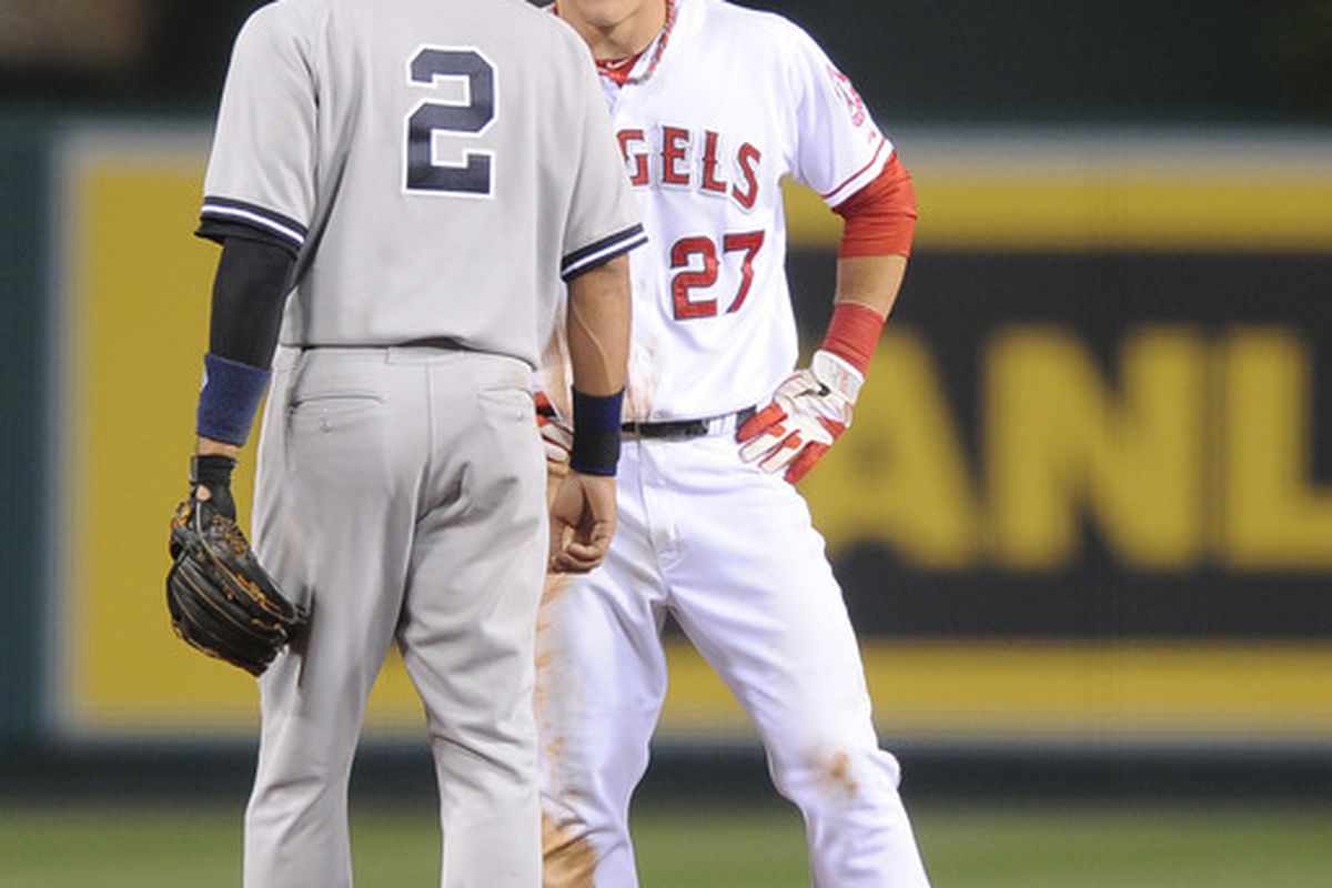 May 30, 2012; Anaheim, CA, USA; Los Angeles Angels left fielder Mike Trout (27) talks to New York Yankees shortstop Derek Jeter (2) after hitting a double during the fourth inning at Angel Stadium of Anaheim. Mandatory Credit: Kelvin Kuo-US PRESSWIRE