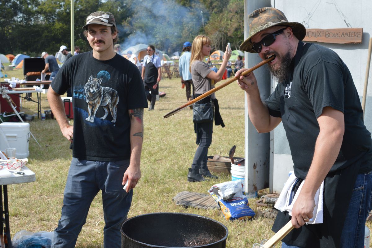 Mason Hereford (L) with Isaac Toups at a boucherie in Grand Coteau in 2014