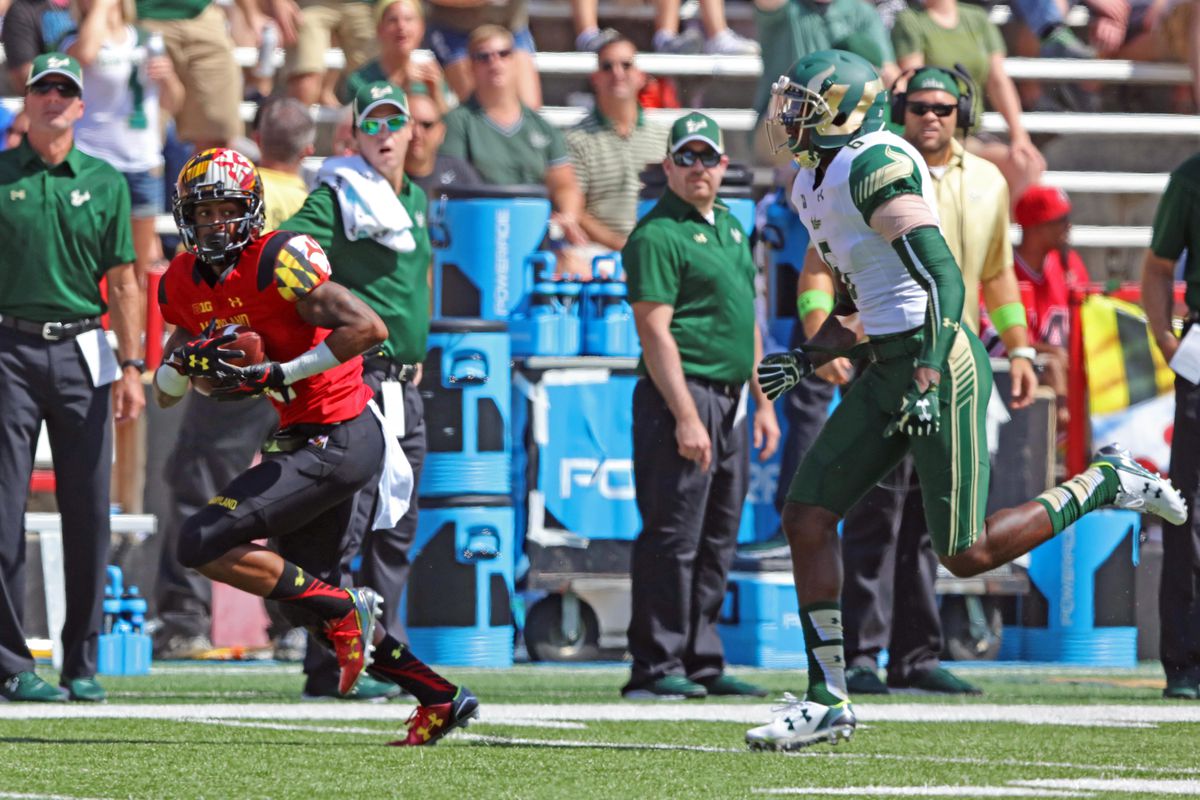 Taivon Jacobs catches a 70-yard touchdown pass against South Florida last weekend.