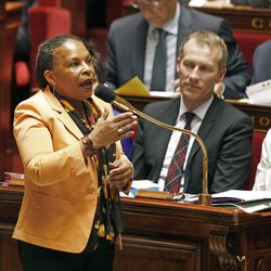 French justice minister Christiane Taubira addresses members of parliament during the questions to the government session, at the National Assembly in Paris, Tuesday April 23, 2013. President Francois Hollande's social reform on gay marriage and adoption have already been approved by both houses of French parliament. The second and final reading is expected today. (AP Photo/Remy de la Mauviniere)