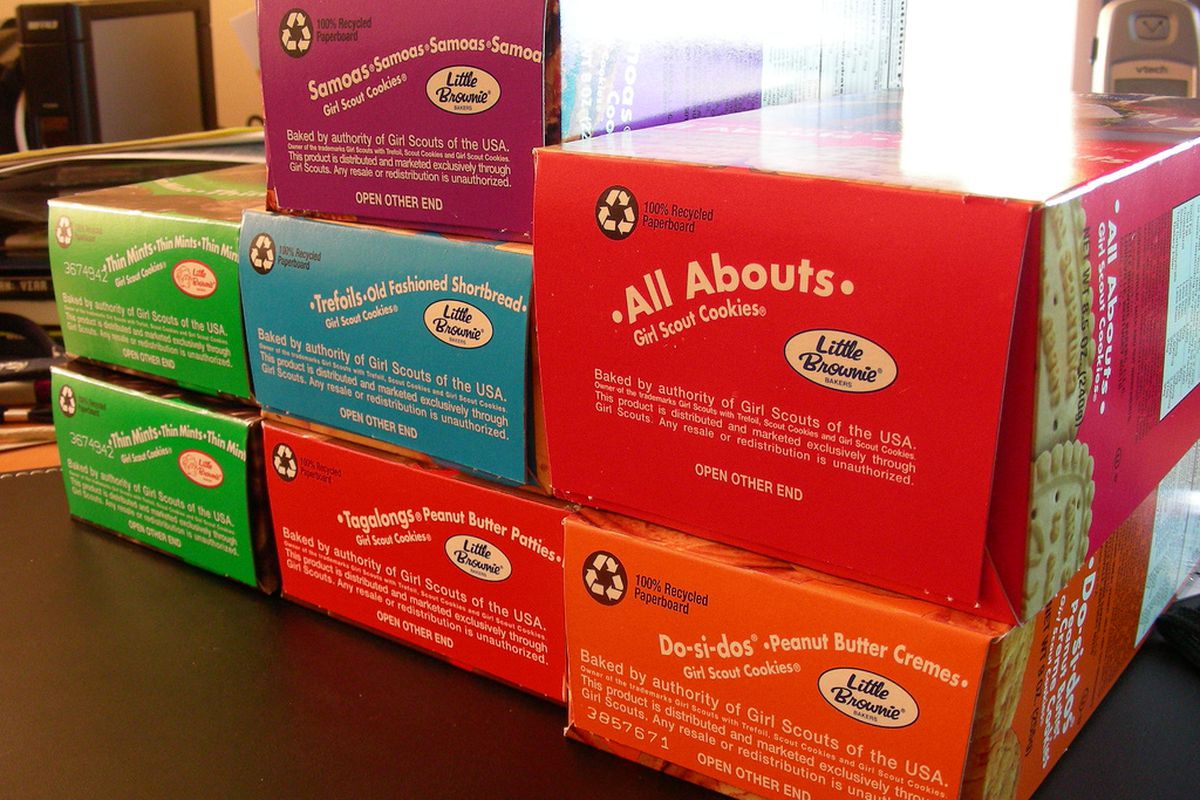 Stacked boxes of Girl Scout cookies.