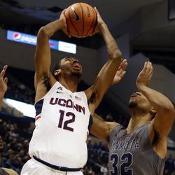 UConn's Tyler Polley (12) during the Monmouth Hawks vs UConn Huskies men's college basketball game at the XL Center in Hartford, CT on December 2, 2017.