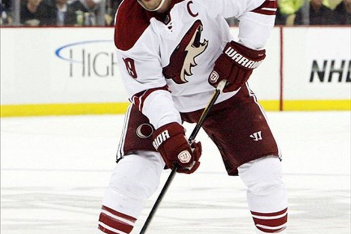 March 5, 2012; Pittsburgh,PA, USA: Phoenix Coyotes right wing Shane Doan (19) moves the puck up ice against the Pittsburgh Penguins during the third period at the CONSOL Energy Center. The Pens won 2-1. Mandatory Credit: Charles LeClaire-USPRESSWIRE