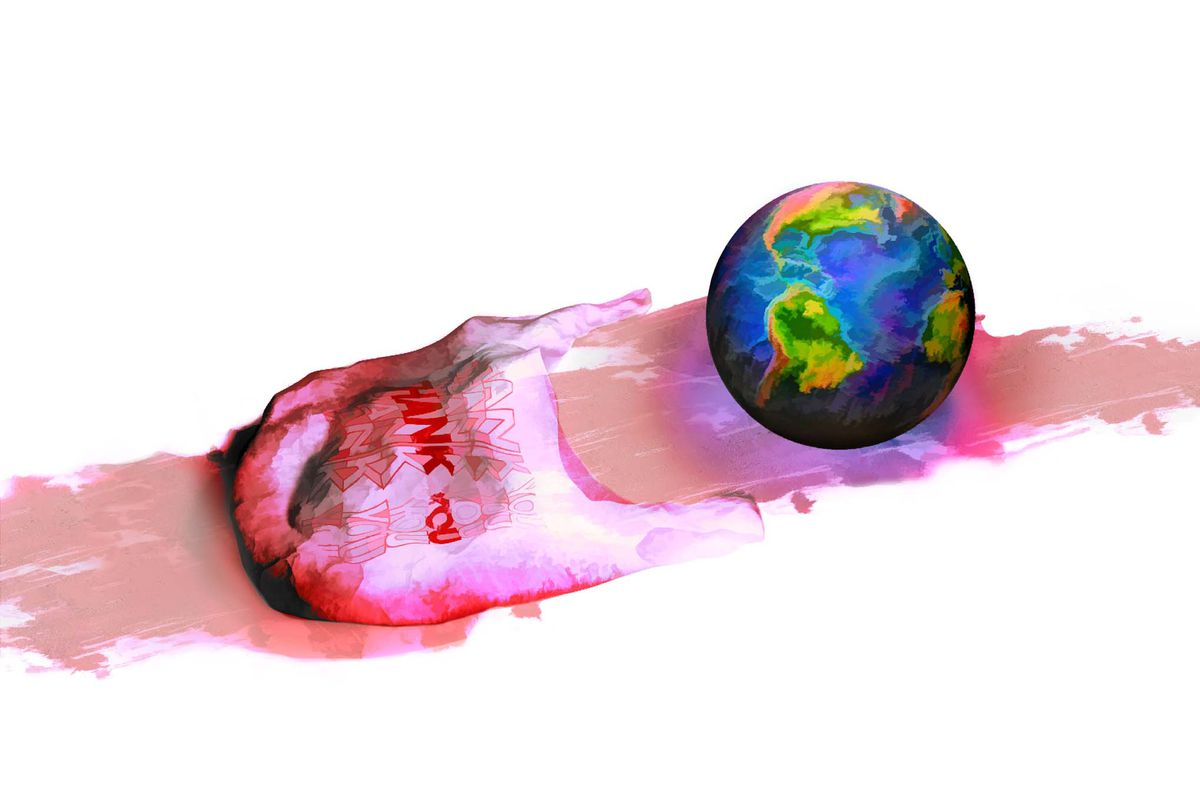 A earth globe that’s fallen out of a plastic bag, laying on the floor.