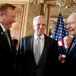 Sen. Jim Dabakis, D-Salt Lake City, left, Elder D. Todd Christofferson and Elder L. Tom Perry, members of the Quorum of the Twelve Apostles of The Church of Jesus Christ of Latter-day Saints, greet one another before an announcement of a historic piece of legislation that will protect Utah’s lesbian, gay, bisexual and transgender community from discrimination in housing and employment while maintaining equal protection for the expression of religious beliefs at the Capitol in Salt Lake City, Wednesday, March 4, 2015.  