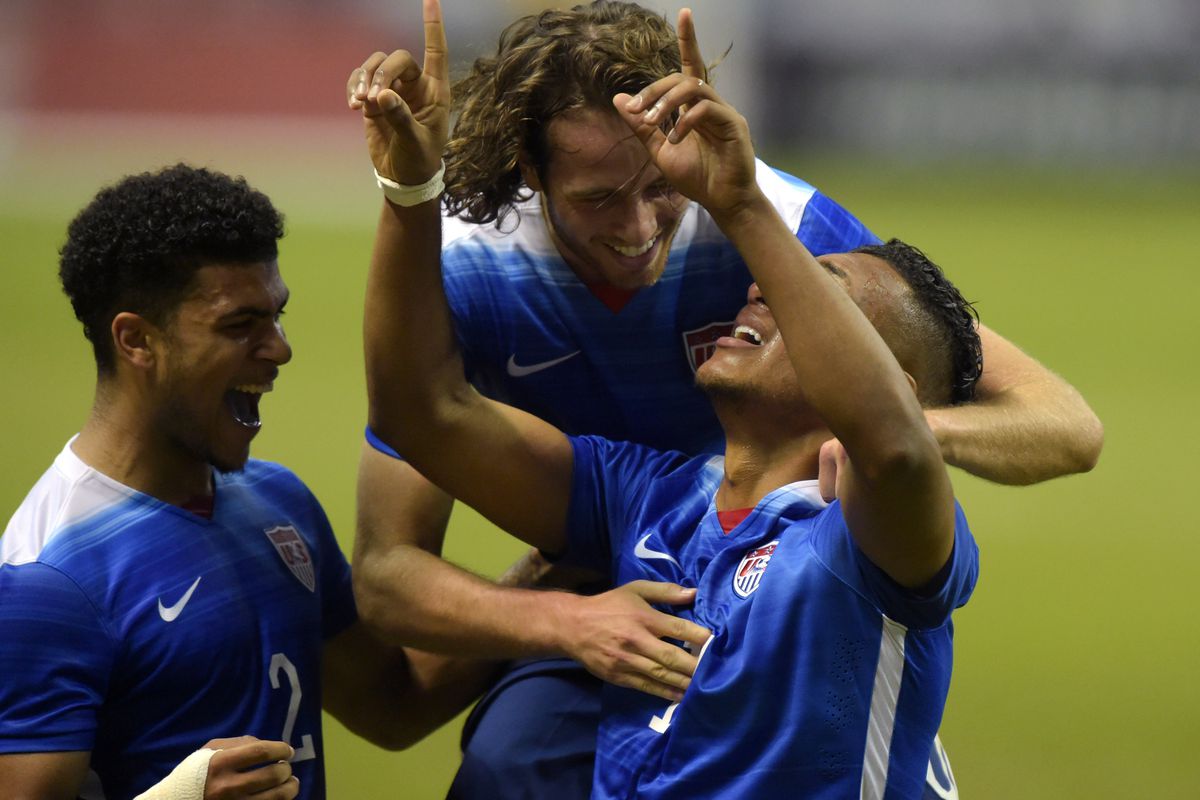 United States forward Juan Agudello (17) celebrates with teammates DeAndre Yedlin (2) and Mix Diskerud (10) after scoring a goal in the second half against Mexico in an international friendly at Alamodome. The United States defeated Mexico 2-0