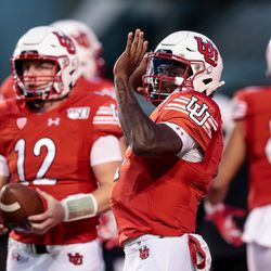 Utah Utes quarterback Tyler Huntley (1) warms up before the game against the Washington State Cougars at Rice-Eccles Stadium in Salt Lake City on Saturday, Sept. 28, 2019.
