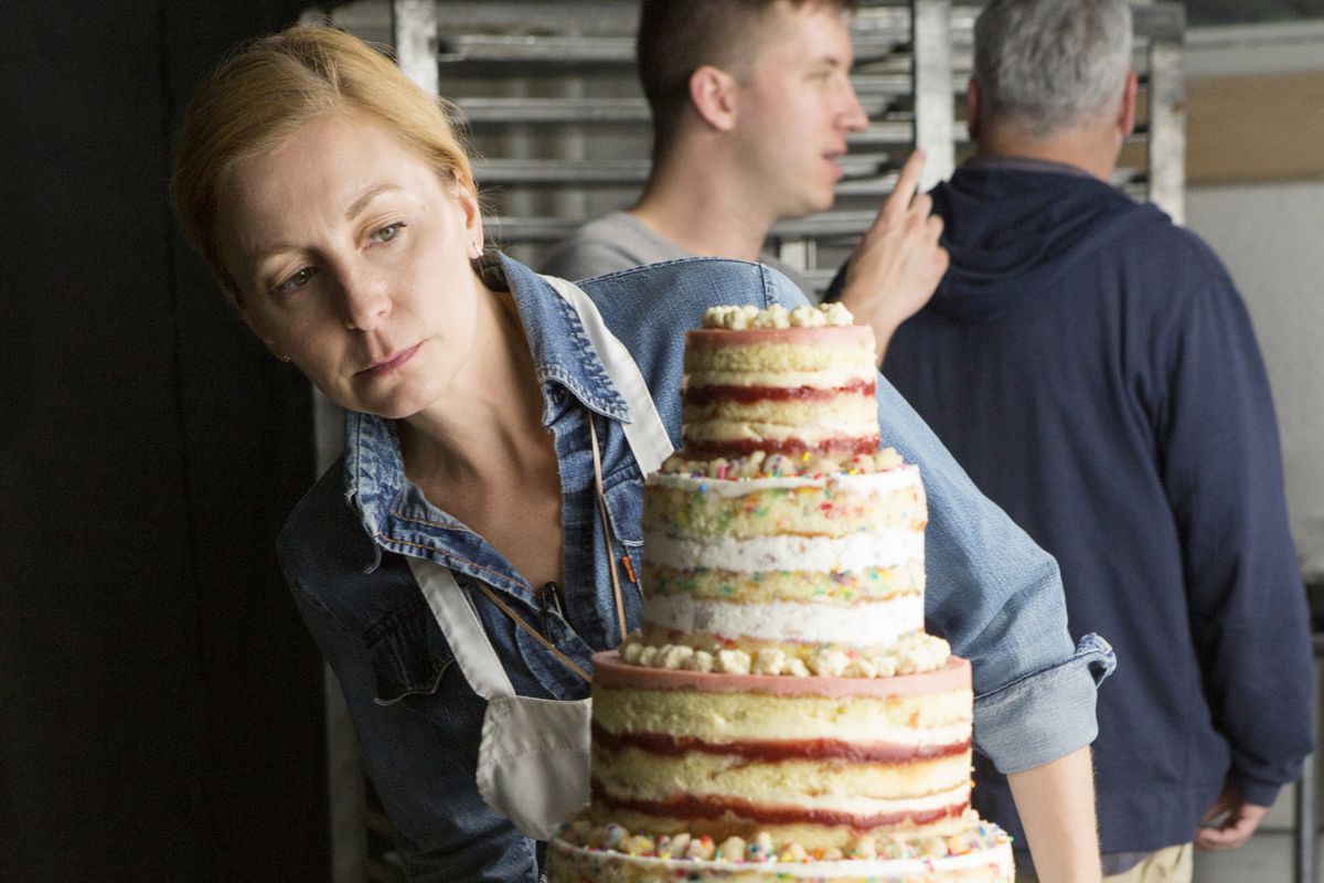 Christina Tosi inspects one of her wedding cakes in a scene from Chef’s Table Pastry.