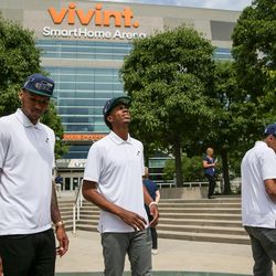 New Utah Jazz players Joel Bolomboy, Tyrone Wallace and Marcus Paige, left to right, check out statues of Karl Malone and John Stockton during a tour of Vivint Smart Home Arena after a press event introducing the new players in Salt Lake City on Wednesday, June 29, 2016.