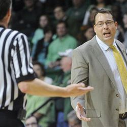 UAB head coach Jerod Haase, right, argues with an official during an NCAA college basketball game against UTEP, Saturday, Jan. 9, 2016, in Birmingham, Ala. UAB won 87-80. (AP Photo/John Amis)