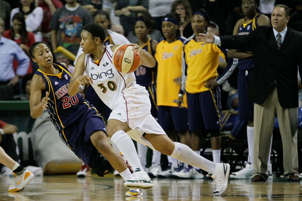 Seattle Storm guard Tanisha Wright's aggressive play from the outset of their rout of the Tulsa Shock was critical to setting the tone for the team. <em>Photo via Kailas Images.</em>