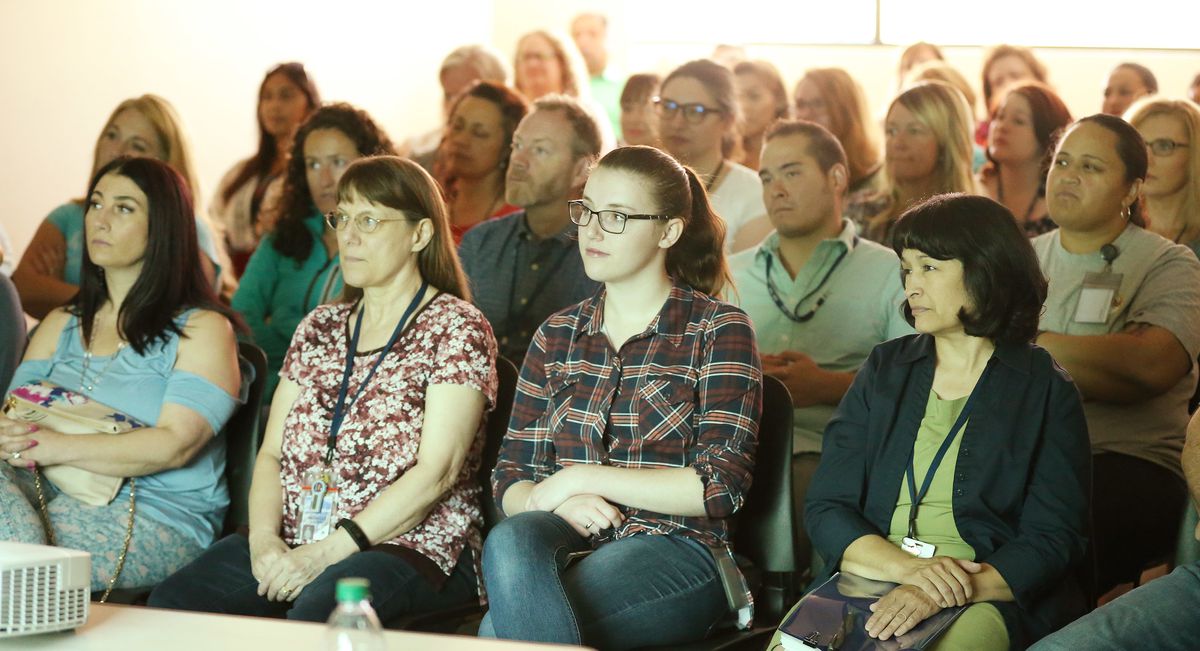 Utah's Office of Recovery Services staff listen during a directors forum in Salt Lake City on Saturday, Aug. 11, 2018. The department is tasked with improving child support payments in the state.