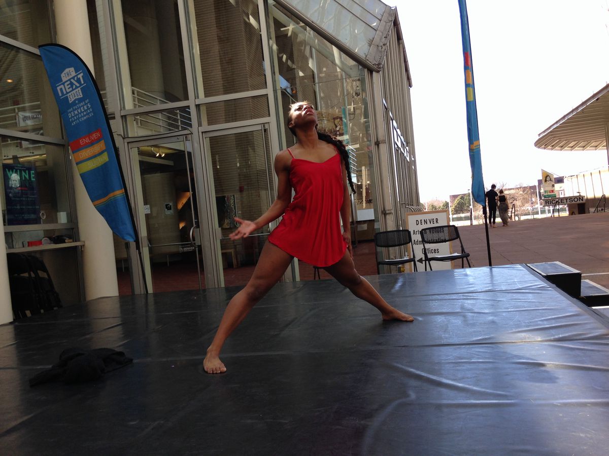 Denver School of the Arts senior Syeeda Keith performs at the unveiling of the plan.