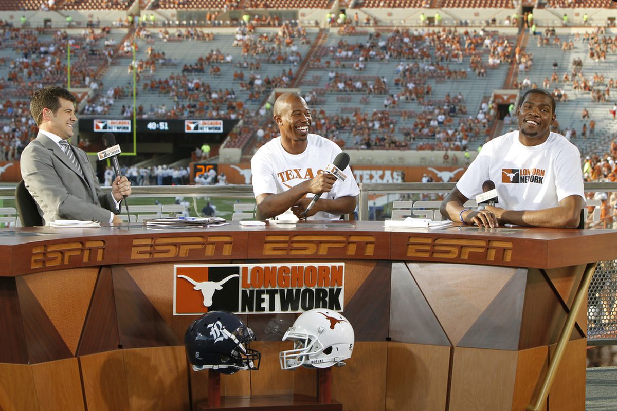 More people probably watched this LHN interview with NBA players T. J. Ford (C) and Kevin Durant from the mostly vacant stands at Darrell K. Royal-Texas Memorial Stadium than on LHN. (Photo by Erich Schlegel/Getty Images)