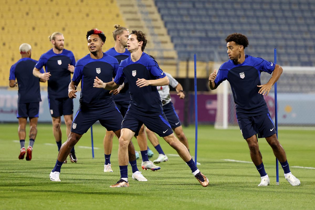 Weston McKennie, Brenden Aaronson and Tyler Adams of United States train during the USA Training Session at Al Gharafa SC on November 24, 2022 in Doha, Qatar.