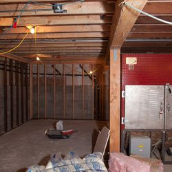 Some early construction shots of the space, including the cherry-red smoker.