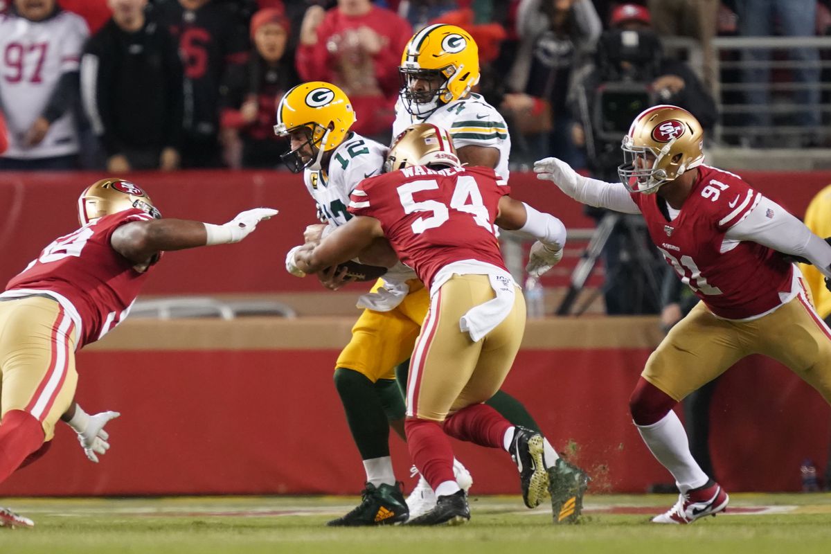 Green Bay Packers quarterback Aaron Rodgers is sacked by San Francisco 49ers middle linebacker Fred Warner creating a fumble during the first quarter at Levi’s Stadium.