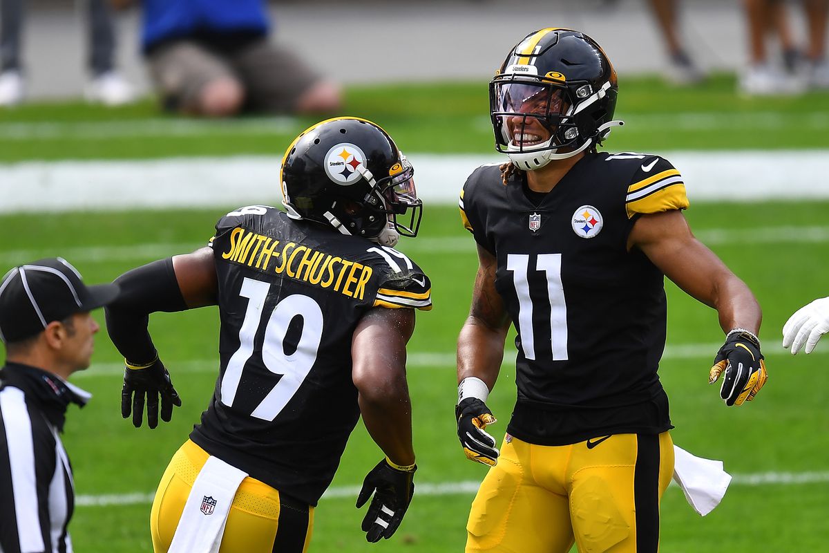 Schuster #19 celebrates his touchdown with Chase Claypool #11 of the Pittsburgh Steelers during the second quarter against the Houston Texans at Heinz Field on September 27, 2020 in Pittsburgh, Pennsylvania.