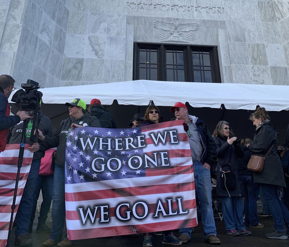 Q-Anon slogan at a TimberUnity rally.