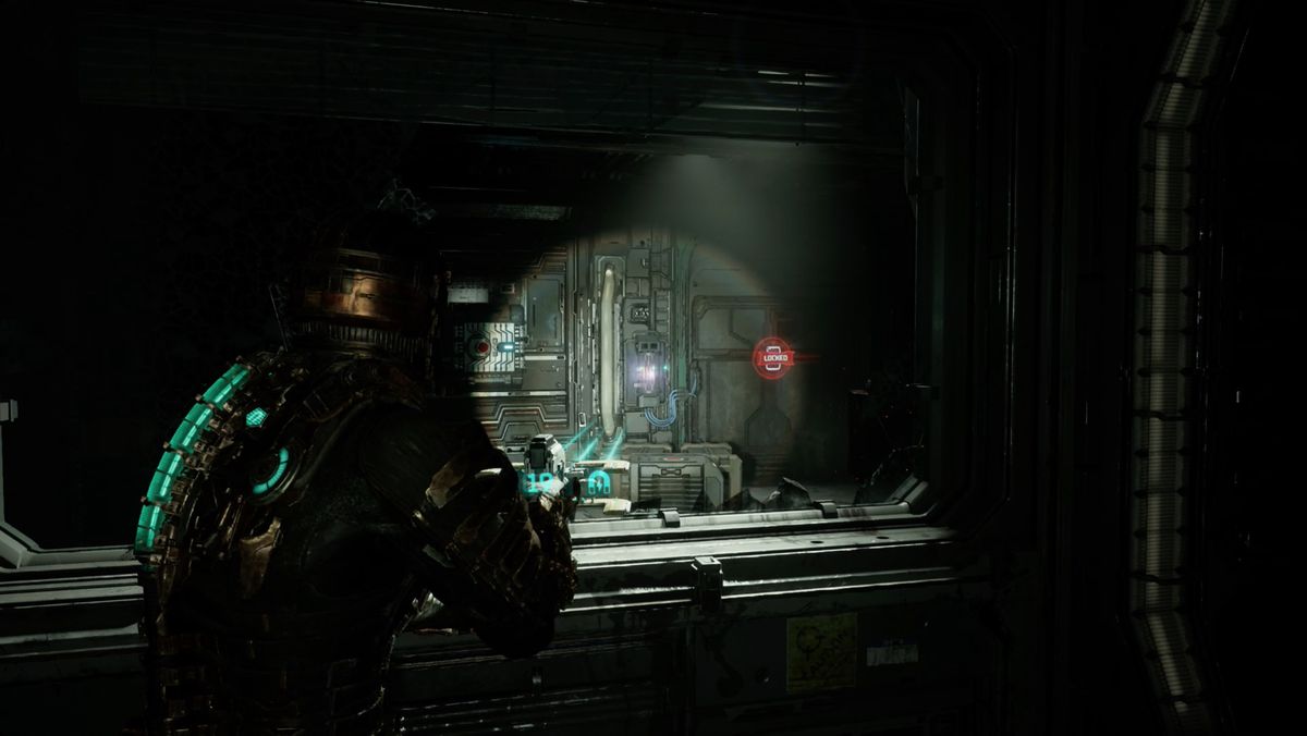 Dead Space Isaac aiming the Plasma Knife at a fuse next to a locked door.