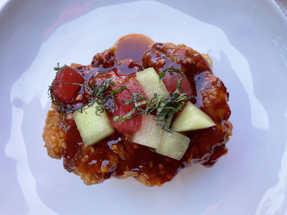 Rooted Craft’s brunchtime fried chicken and waffle with hot honey and compressed melon