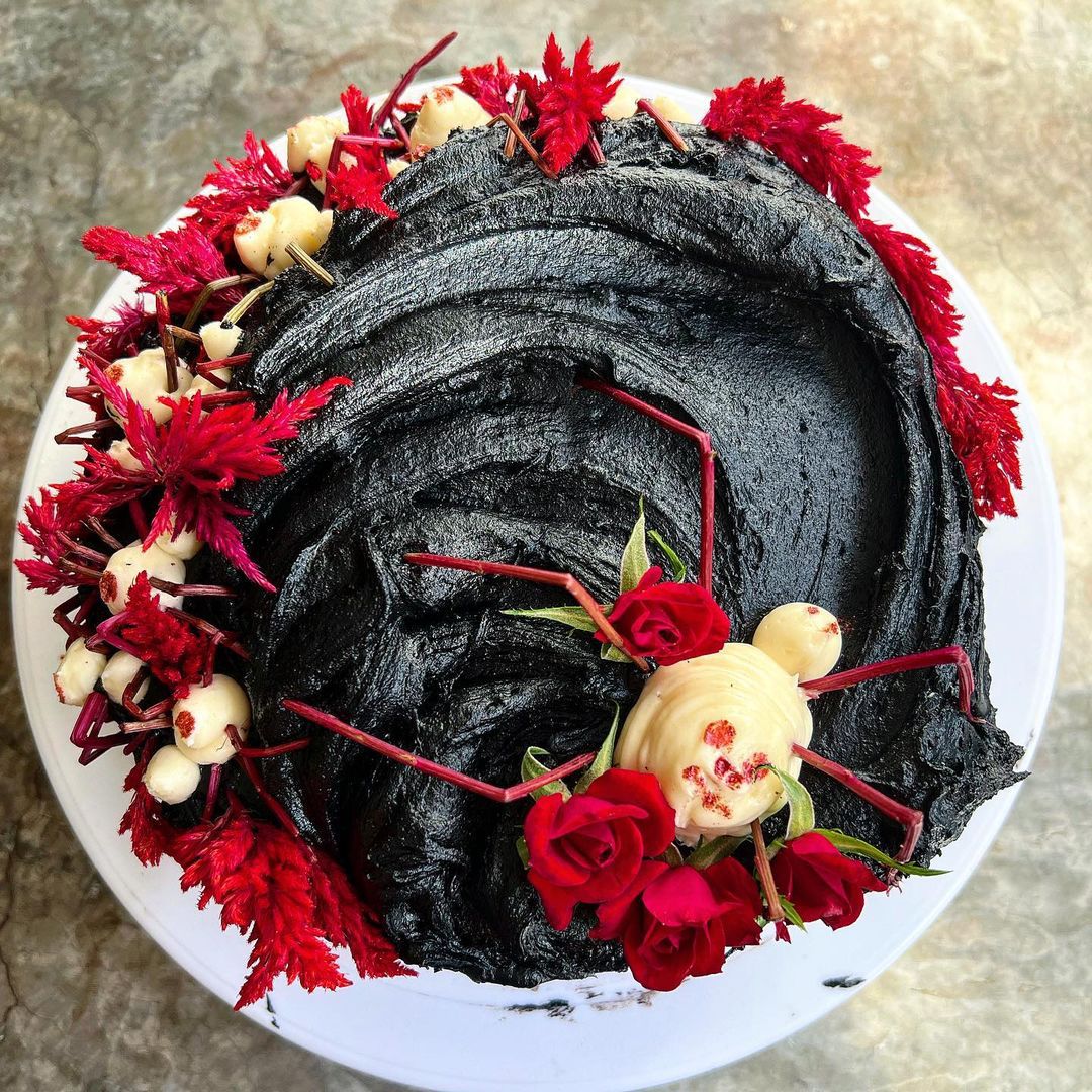 An overhead of a black cake.