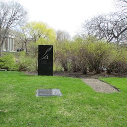 4/17/15: Ernie’s shrub begins to bud.  The large temple on the other side of the pond is the Palmer family monument, largest in Graceland -
