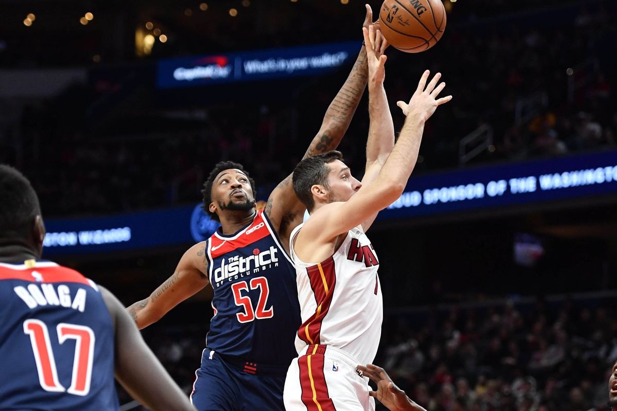 Washington Wizards guard Jordan McRae blocks the shot of Miami Heat guard Goran Dragic during the first quarter at Capital One Arena.