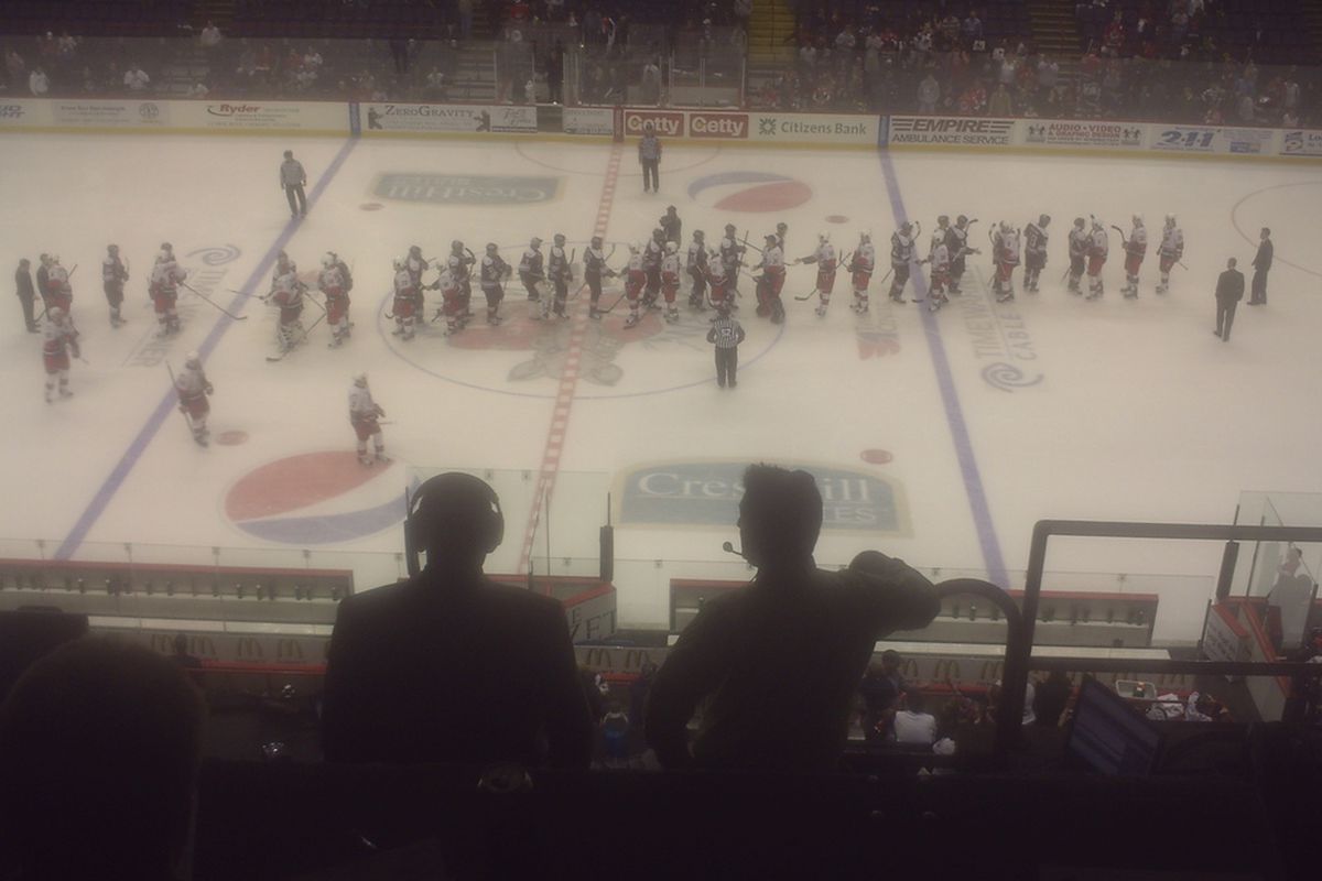 The Hershey Bears and Albany River Rats shake hands after Albany is eliminated on 4/29/10.