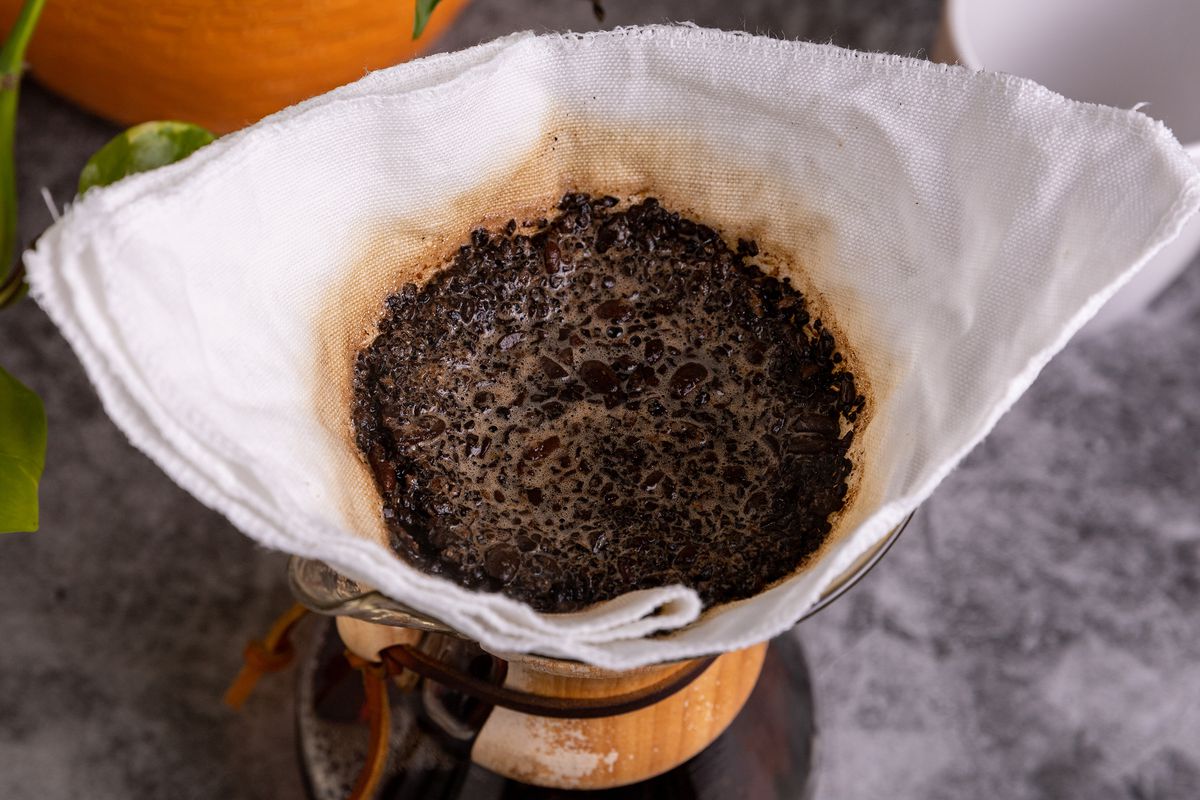 Used coffee grounds in a pour over filter.