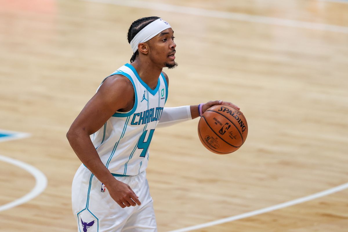 Charlotte Hornets guard Devonte’ Graham brings the ball up court against the Sacramento Kings during the second half at Spectrum Center. The Charlotte Hornets won 122-116.