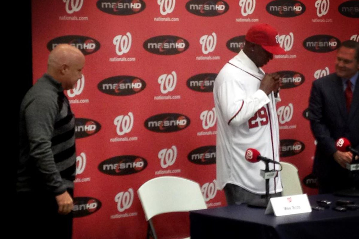 The Washington Nationals introduced new closer Rafael Soriano to the nation's capital this afternoon at a press conference in Nationals Park. Soriano, center, put on his #29 jersey with DC GM Mike Rizzo (left) and Scott Boras (right) looking on.