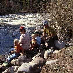 The Heyborne men sit next to a river when Kirby is 4 years old.
Left to right: Dustin Heyborne, Bruce Heyborne (Kirby's father), Kirby Heyborne, Chad Heyborne and Grandpa Heyborne. 
