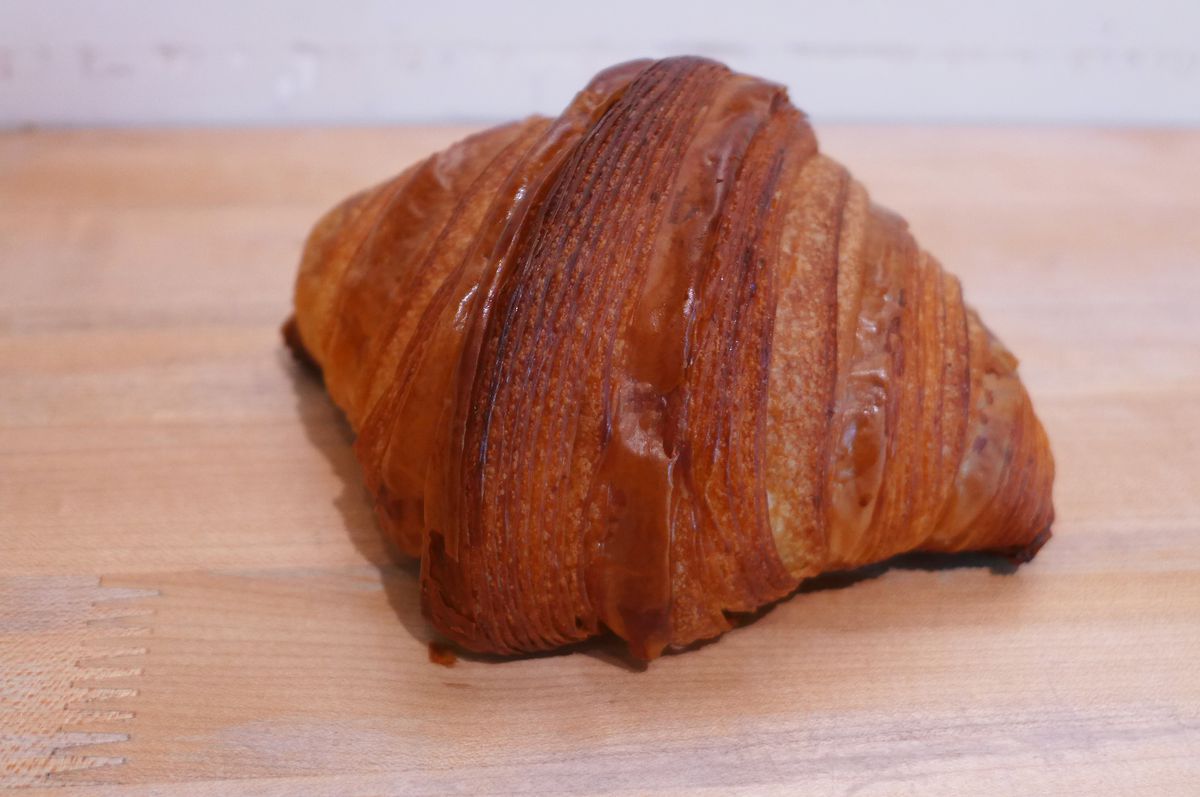 A dark and linear croissant.