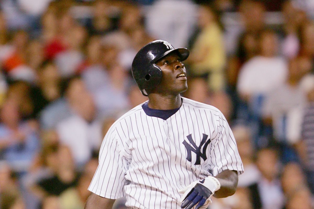 New York Yankees’ Matt Lawton hits a two-run homer against t