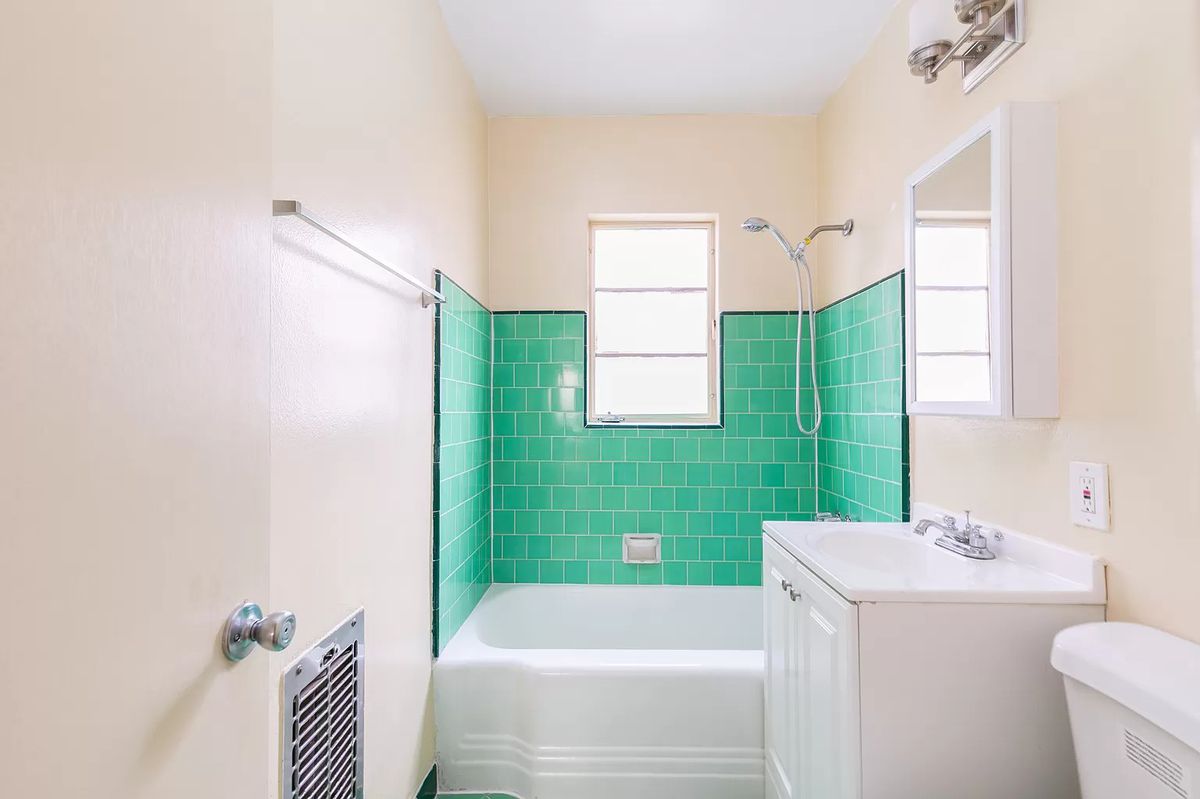 Bathroom with green tile