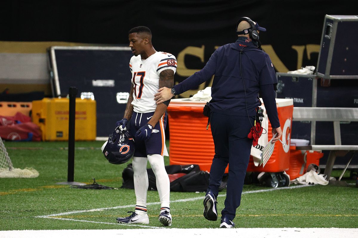 Matt Nagy walks away from receiver Anthony Miller after he was ejected from the Bears’ playoff loss in January.