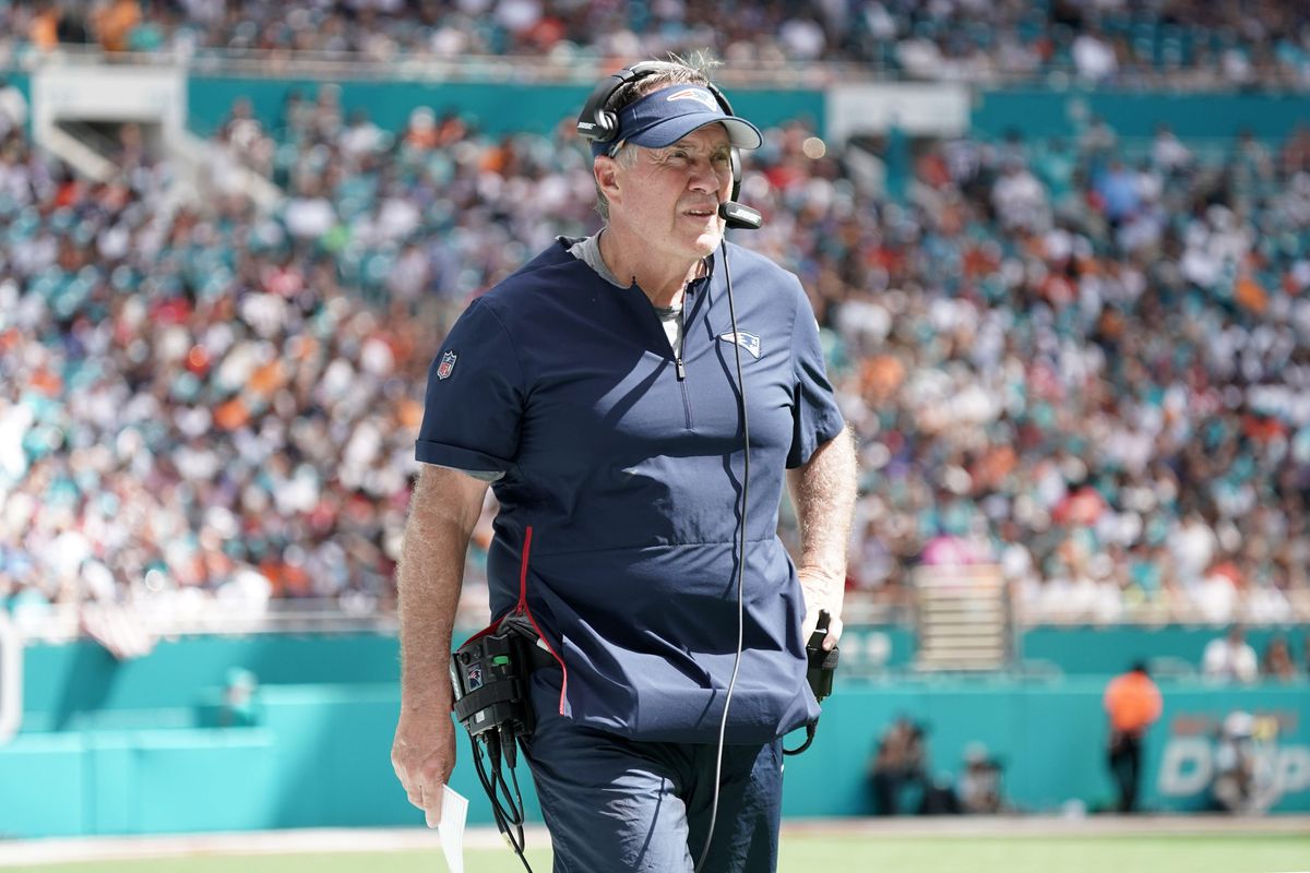 New England Patriots head coach Bill Belichick watches from the sidelines in the second half against the Miami Dolphins at Hard Rock Stadium.