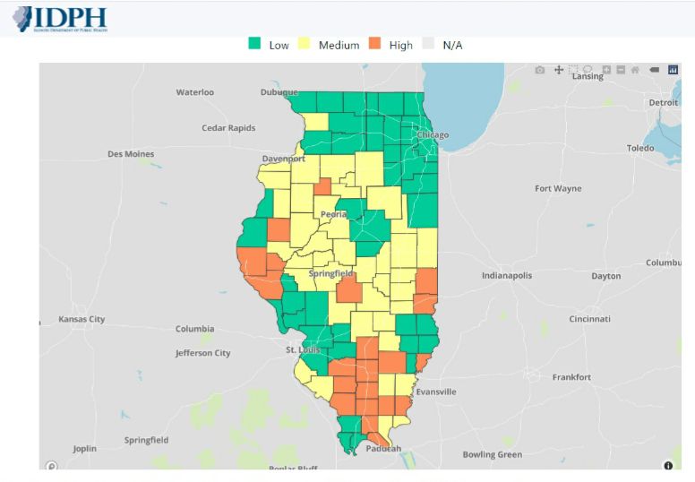 Color-coded U.S. Centers for Disease Control and Prevention map of Illinois as of February 28, 2022. Counties are designated green for low, yellow for medium and orange for high based on hospitalization and caseload metrics. Different precautionary measures are recommended at each level.