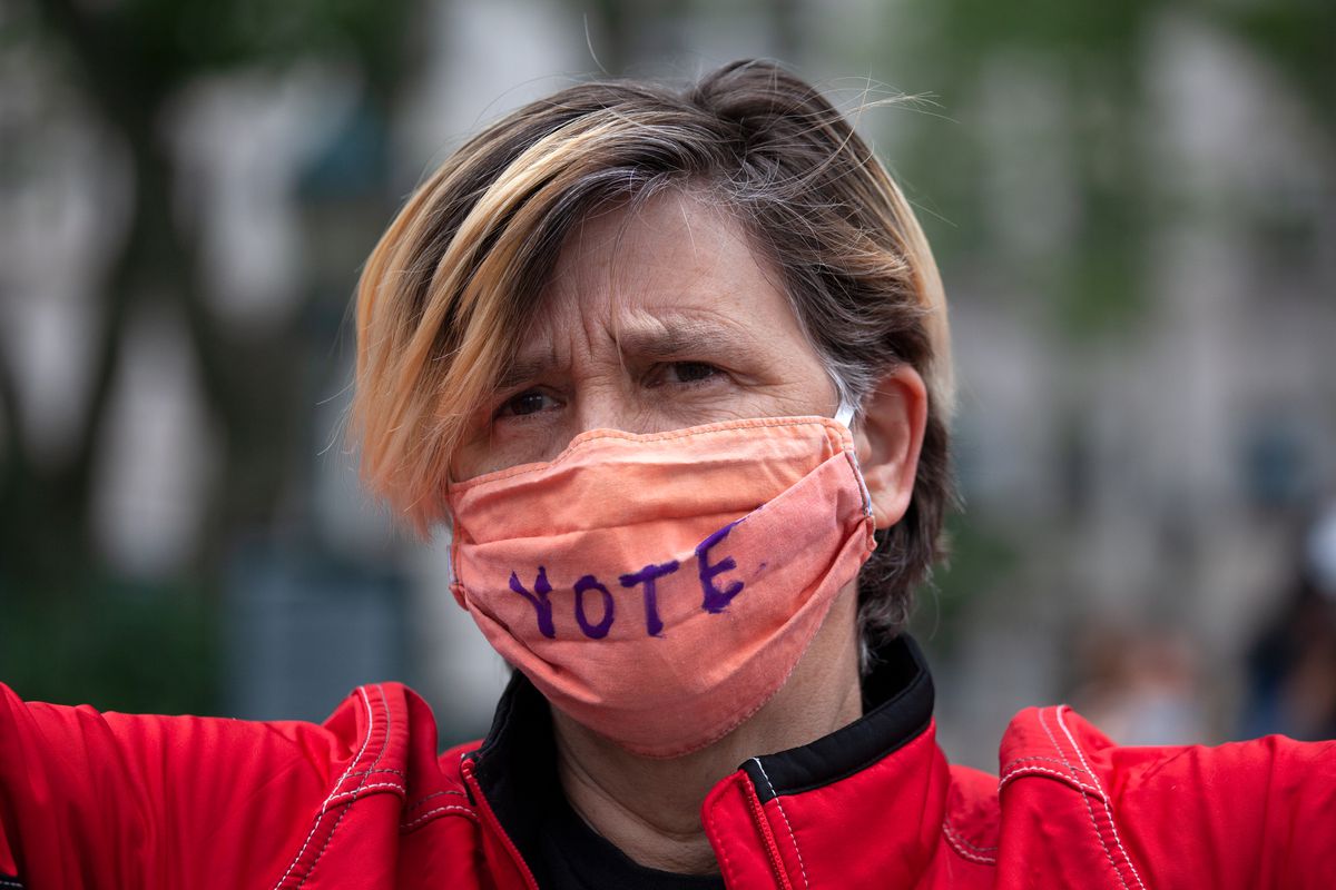 A protester wears a “vote” mask in Foley Square, June 2, 2020.