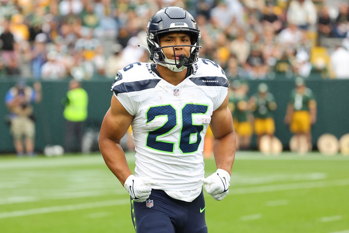 Zach Charbonnet of the Seattle Seahawks takes the field prior to a preseason game against the Green Bay Packers at Lambeau Field on August 26, 2023 in Green Bay, Wisconsin.