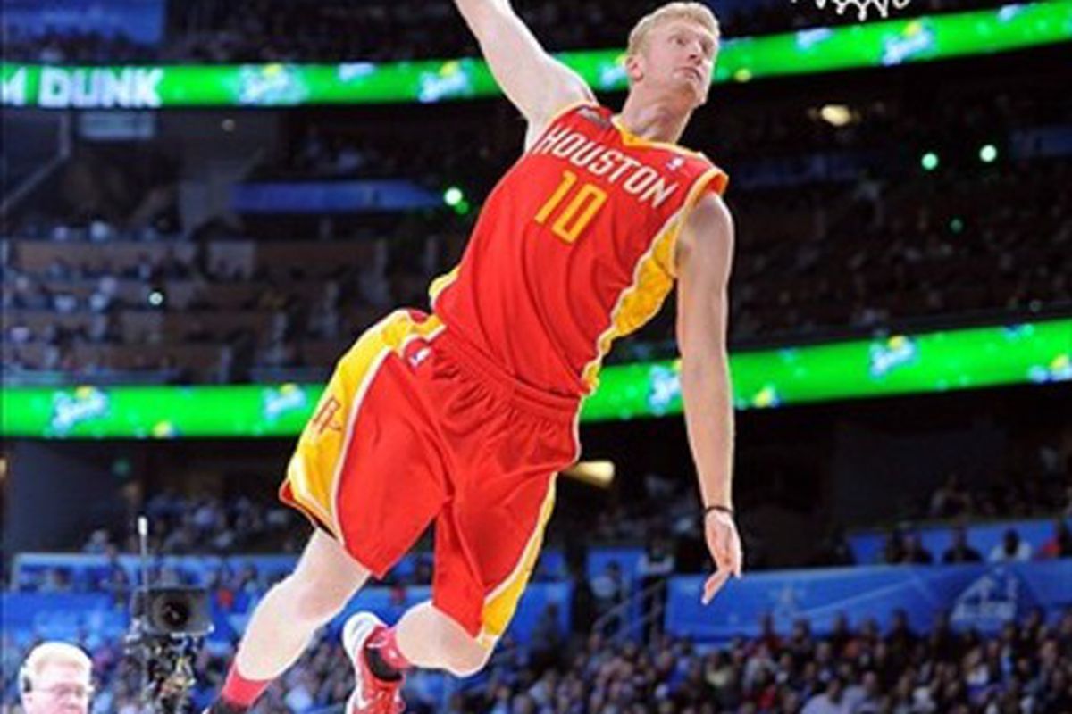 Feb 25, 2012; Orlando, FL, USA; Chase Budinger of the Houston Rockets completes a dunk in the 2012 NBA All-Star Slam Dunk Contest at the Amway Center. Mandatory Credit: Bob Donnan-US PRESSWIRE