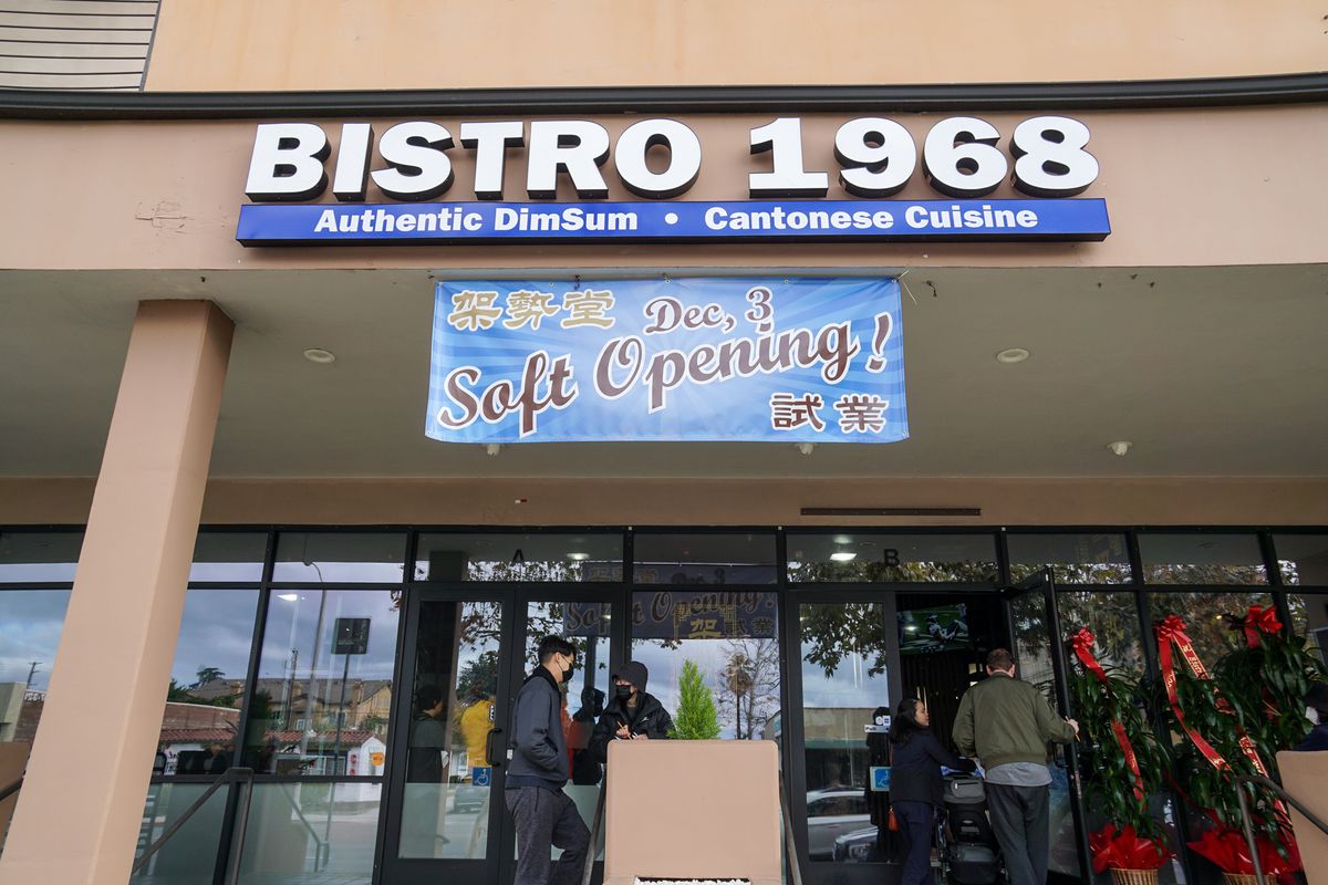 Outside Bistro 1968 in San Gabriel with a soft opening sign on December 3.