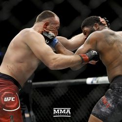 Oleksiy Oliynyk and Curtis Blades trade shots at UFC 217.