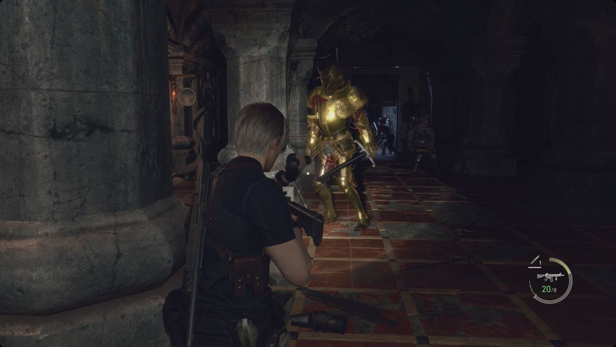 Resident Evil 4&nbsp;remake&nbsp;Leon facing three armadura — two in regular armor and one in gold armor — in the Mausoleum