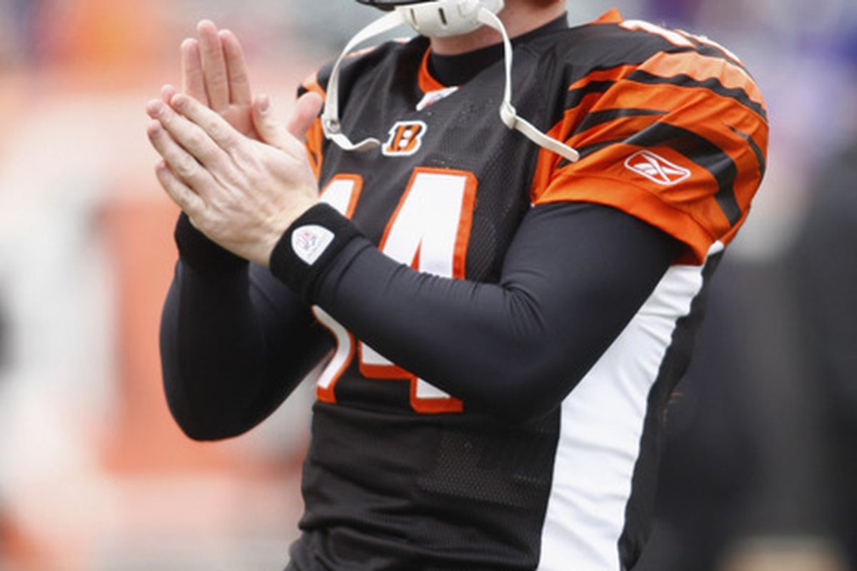 CINCINNATI, OH - JANUARY 01:  Andy Dalton #14 of the Cincinnati Bengals warms up before the game against the Baltimore Ravens at Paul Brown Stadium on January 1, 2012 in Cincinnati, Ohio.  (Photo by John Grieshop/Getty Images)